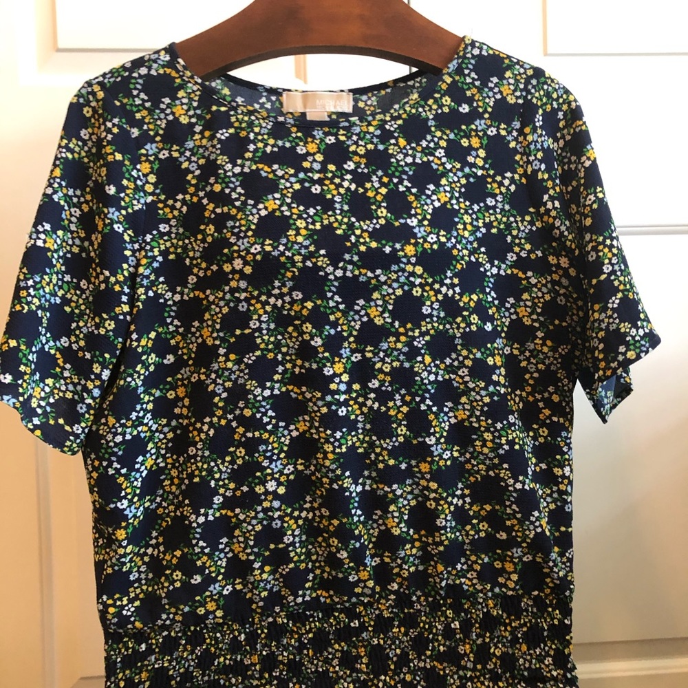 Michael Kors beautiful floral blouse. Can be worn with so much. So pretty